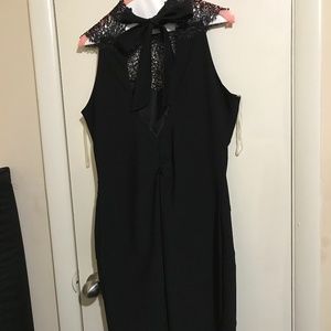 Chic Black Sleeveless Mini Dress with Lace Detail